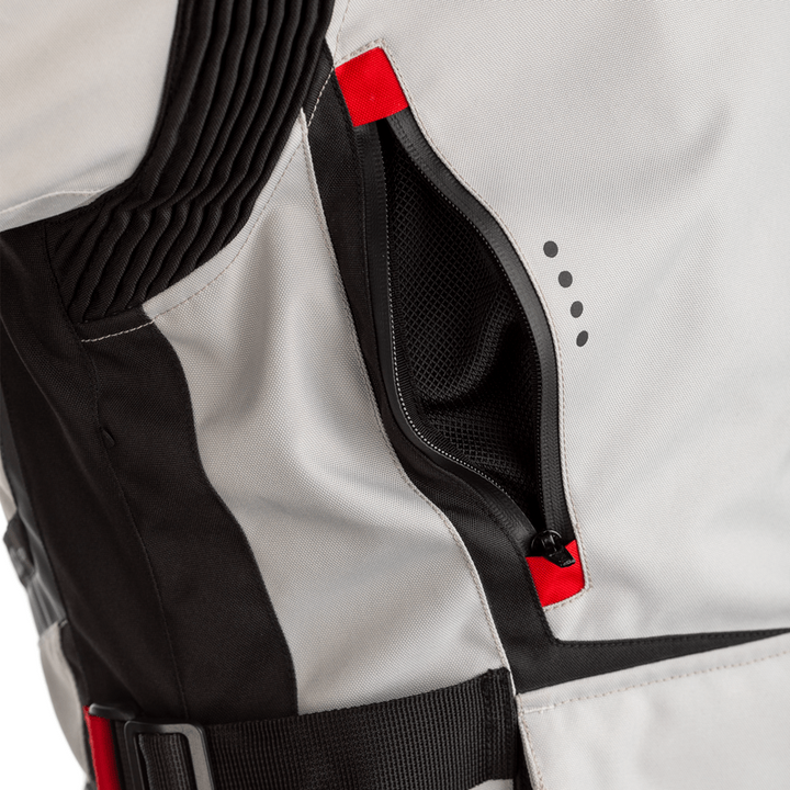 Ficka med dragkedja på RST Textil Mc-Jacka Maverick Grå. Praktisk förvaring med ventilerande meshmaterial för säker och bekväm användning.