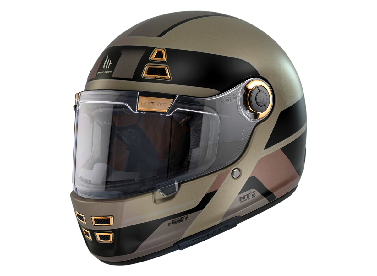 MT Helmets Integral Mc-Hjälm Jarama 68TH C9 Gold Matt med modern design i guld och svart, utrustad med visir och ventilationssystem. Perfekt för motorcyklister som söker stil och säkerhet.